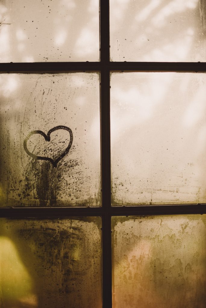 A heart drawn on a wet window represents Valentine's Day at Ku Cha House of Tea