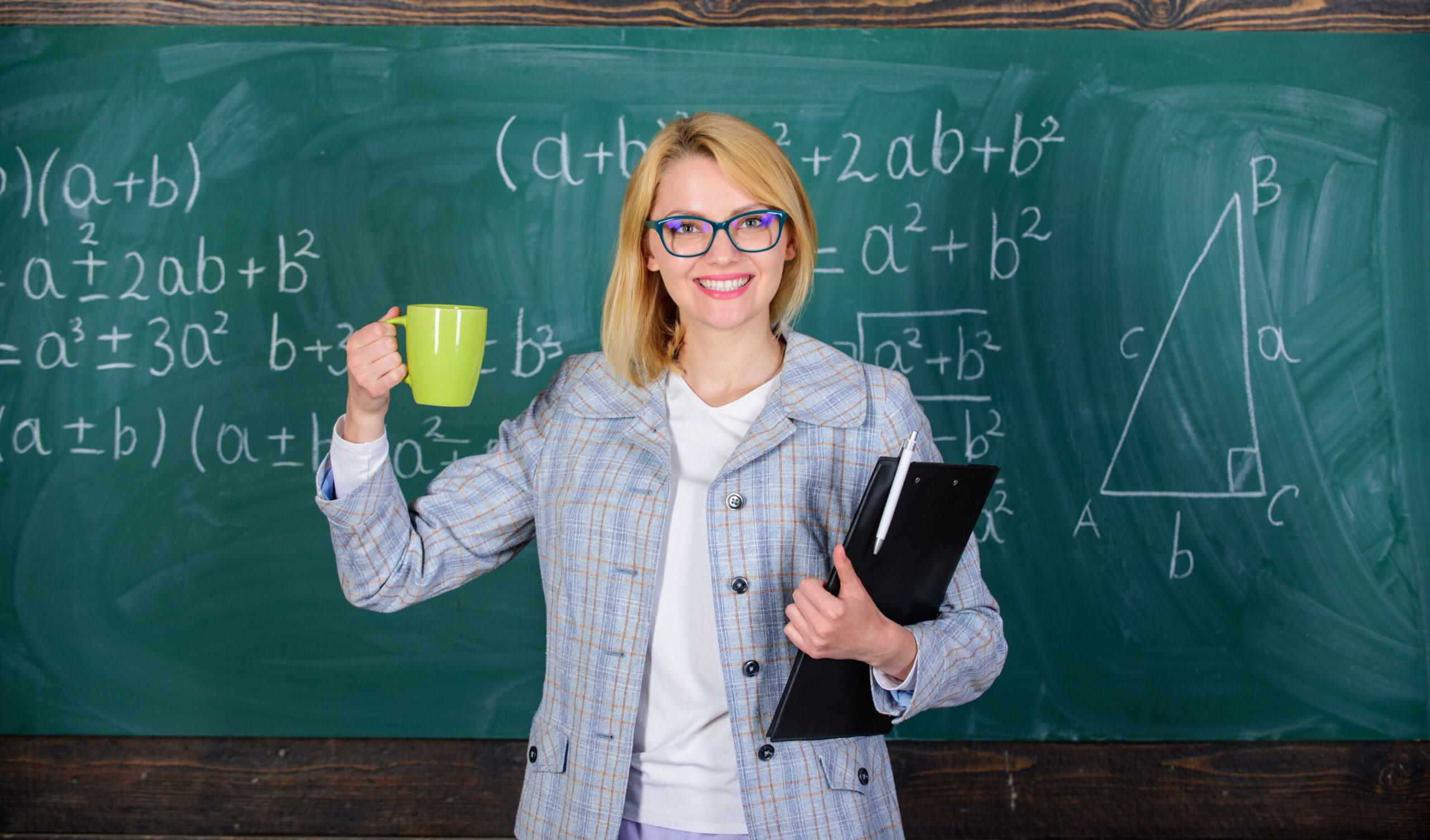 teacher holding tea mug